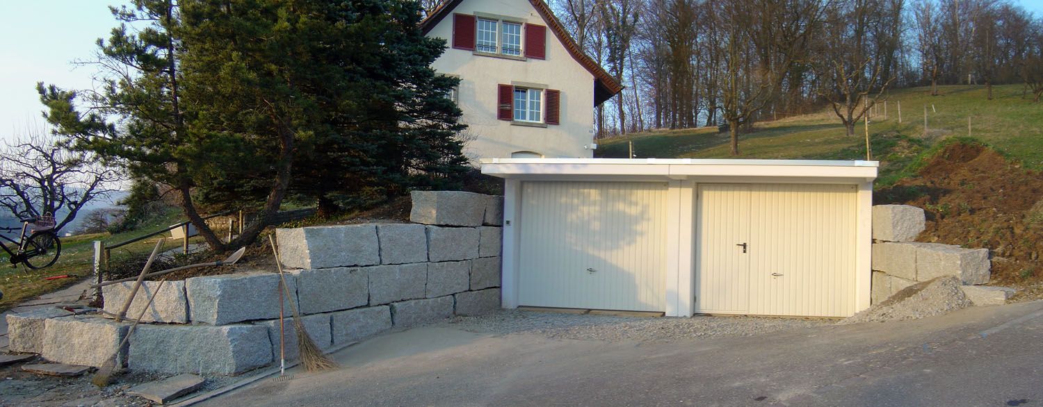 Natursteinmauer im Garten - Wüthrich Gartenbau in Hausen