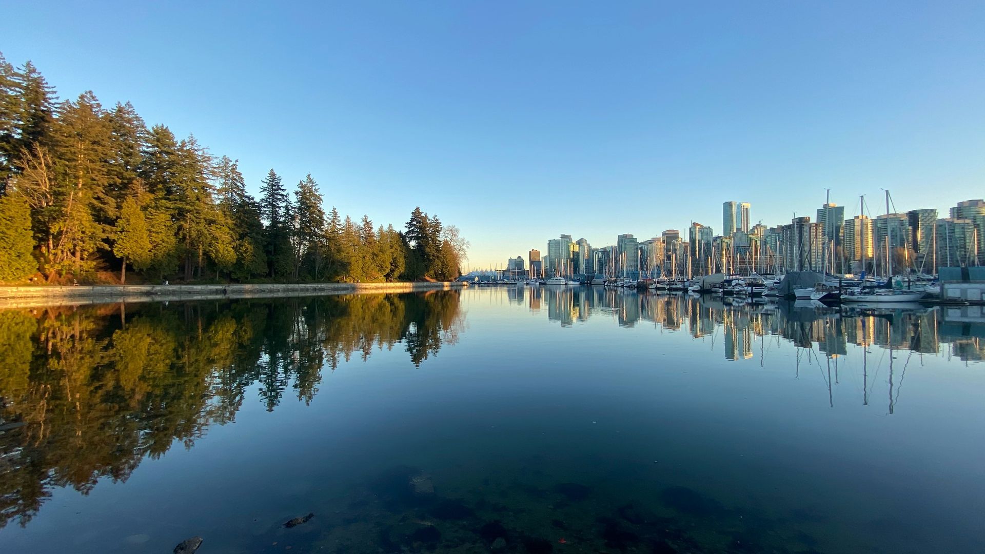 Vancouver skyline with mountains and Pacific Ocean.