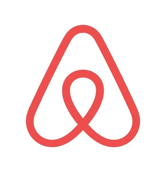 Un logotipo rojo sobre un fondo blanco.