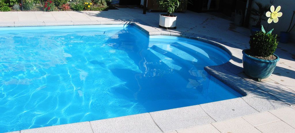 Umrandungsplatten versetzt - Hadorn Gartenbau