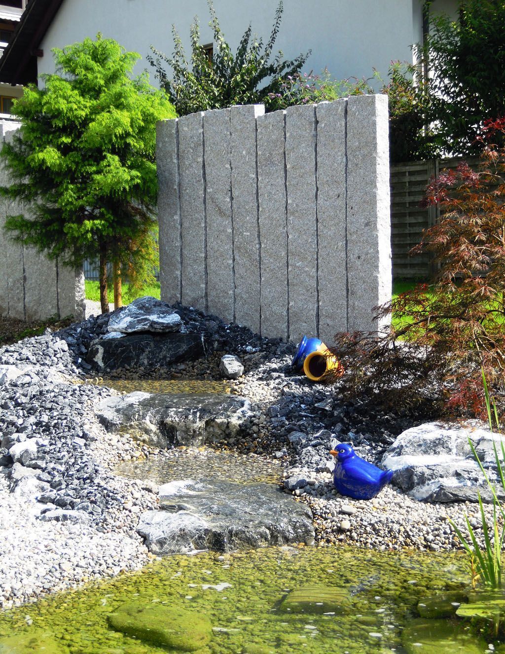  Bachlauf mit Balzerssteinen - Hadorn Gartenbau