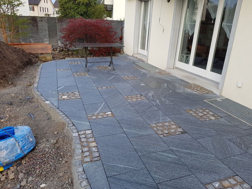 Platten mit Pflästerung - Hadorn Gartenbau