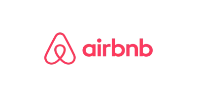 The airbnb logo is red and white on a white background.