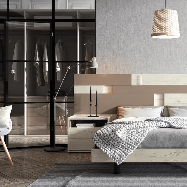 Un dormitorio con una cama, una mesita de noche y una silla.
