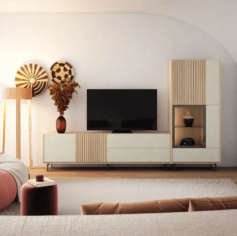 Una sala de estar con un sofá y un televisor de pantalla plana.