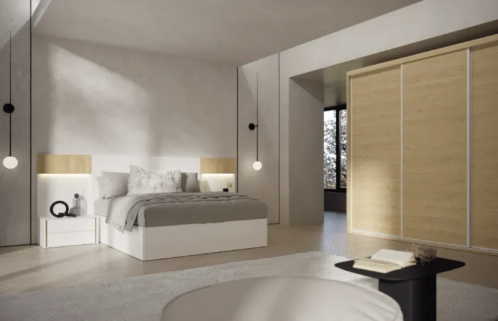 Un dormitorio con una cama, mesitas de noche, puertas correderas y una mesa.