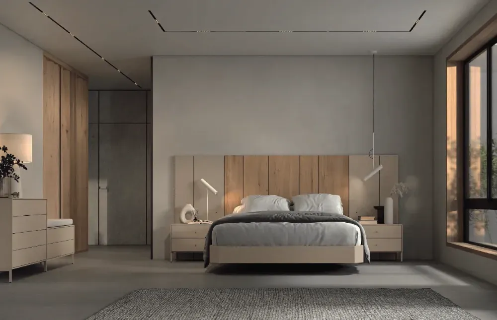 Un dormitorio con cama, mesita de noche, cómoda y ventana.