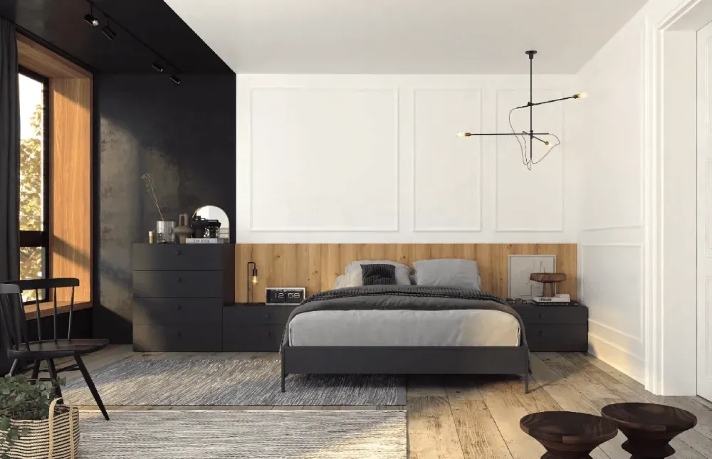 Un dormitorio con una cama, mesitas de noche y una gran ventana.