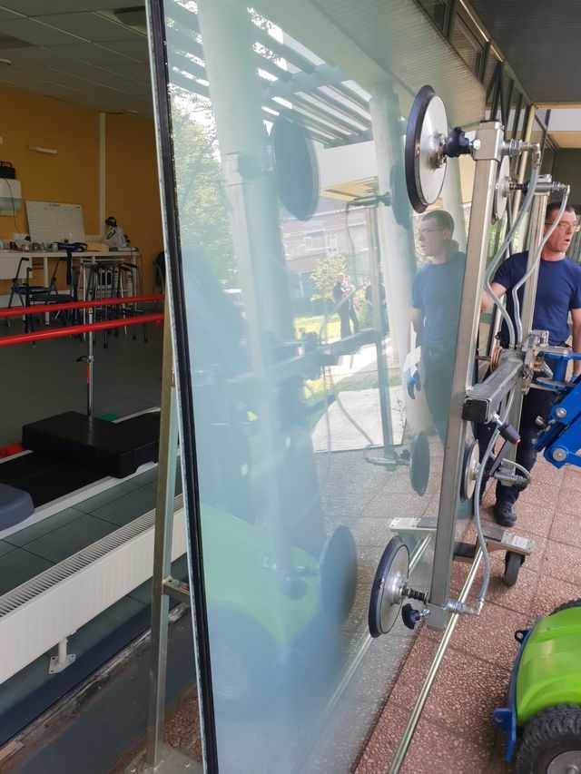 Pose de vitre de bâtiment