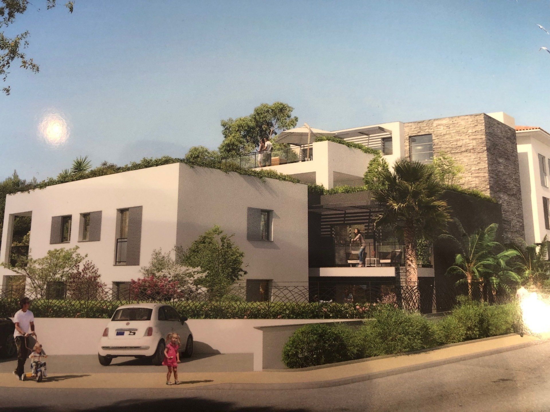 Résidence avec espaces verts et places de parkings