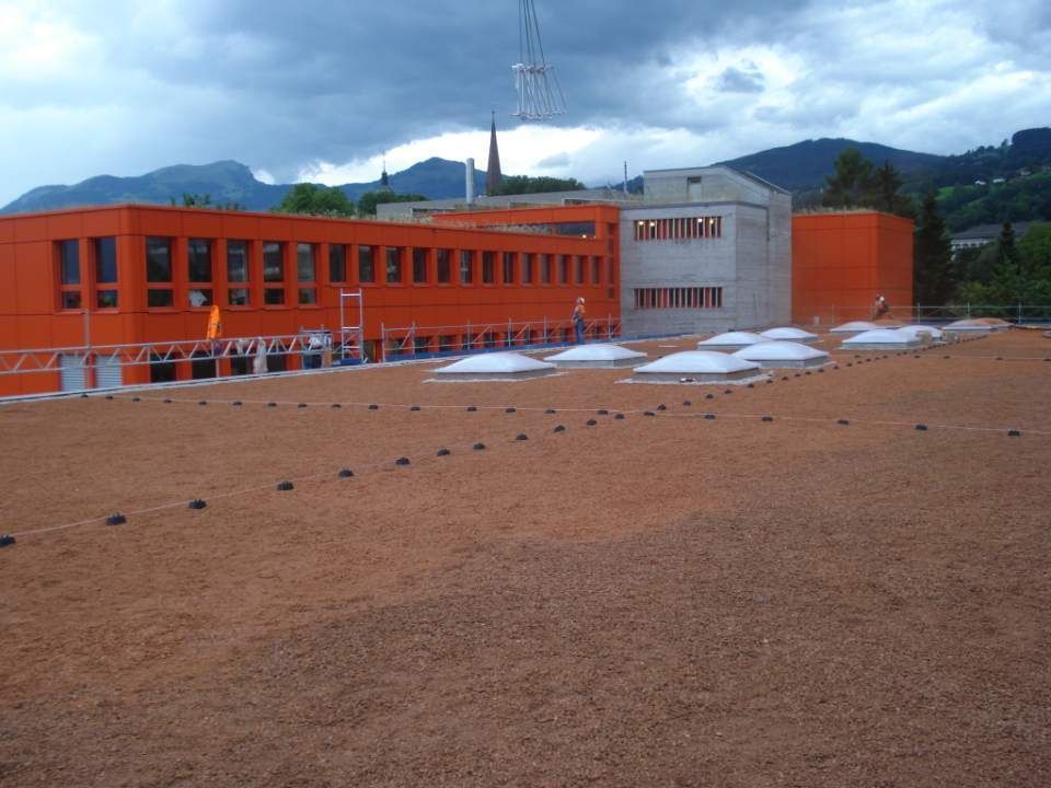 müggler spenglertechnik gmbh – Gebäude mit roter Fassade