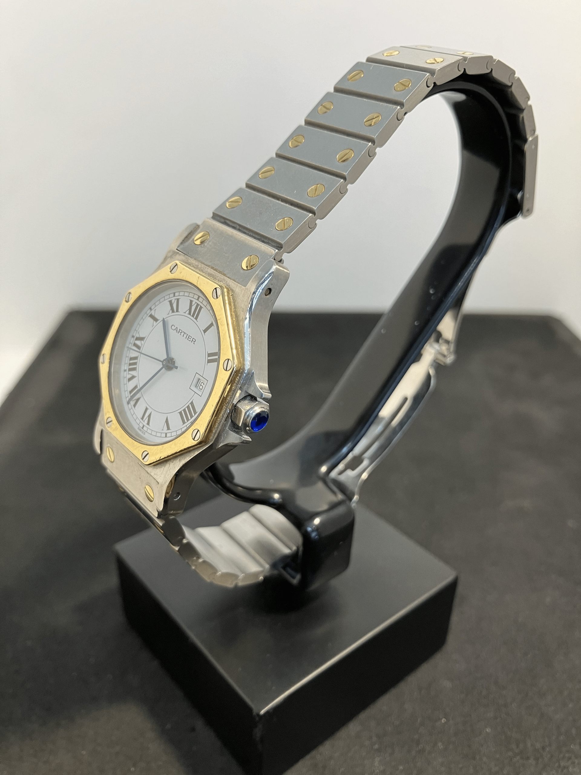 Montre Cartier en acier et or.