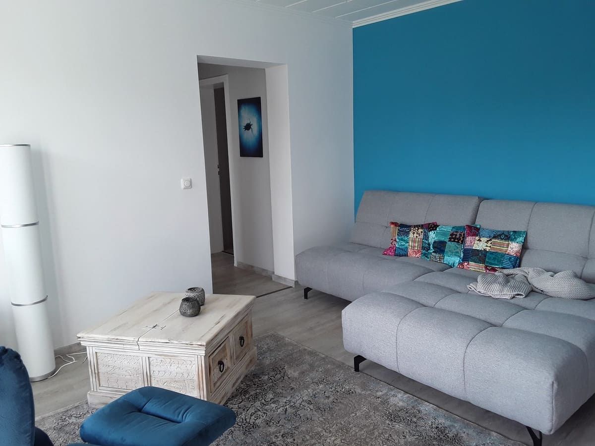 Wohnzimmer einer Ferienwohnung auf der Wasserburg Anstel