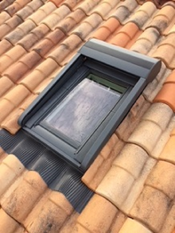 Velux sur toiture en tuiles
