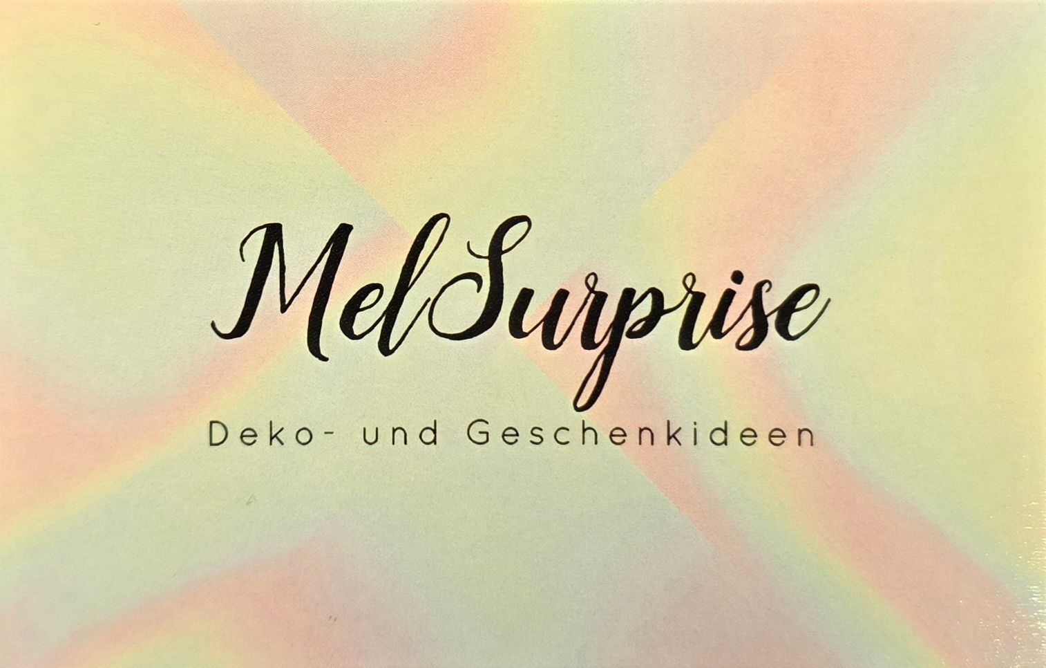 Mel Surprise logo with script text on a colorful, pastel background; 