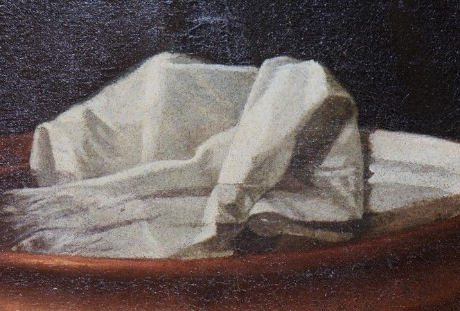 Tableau d'un chiffon blanc dans un bol après restauration.
