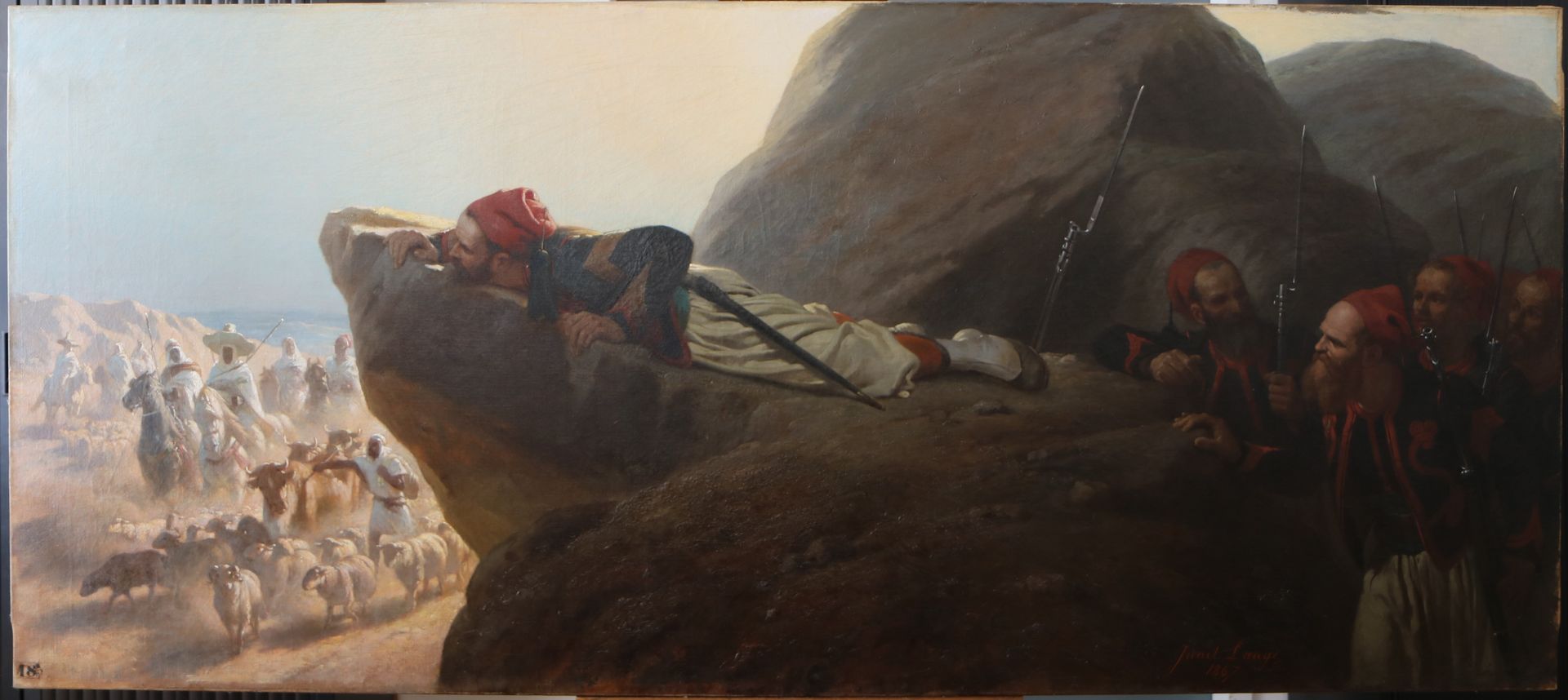 Tableau après restauration :  hommes armés cachés dans les rochers.