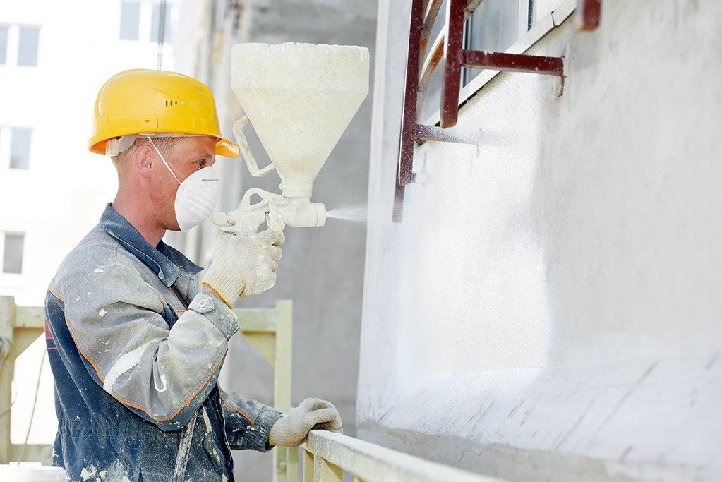 Artisan au pistolet à peinture