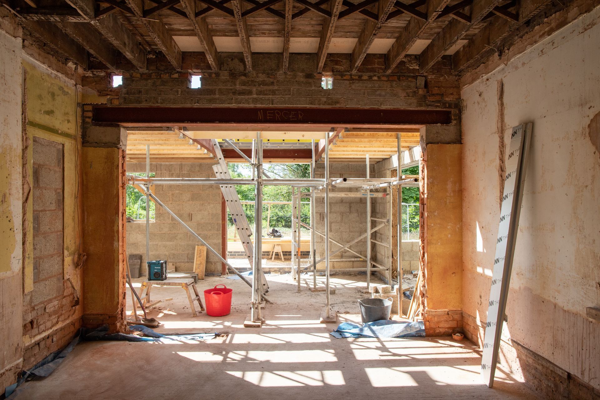 Ouverture d'un mur pour une extension de maison