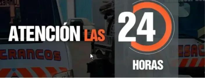 A sign that says atencion las 24 horas on it