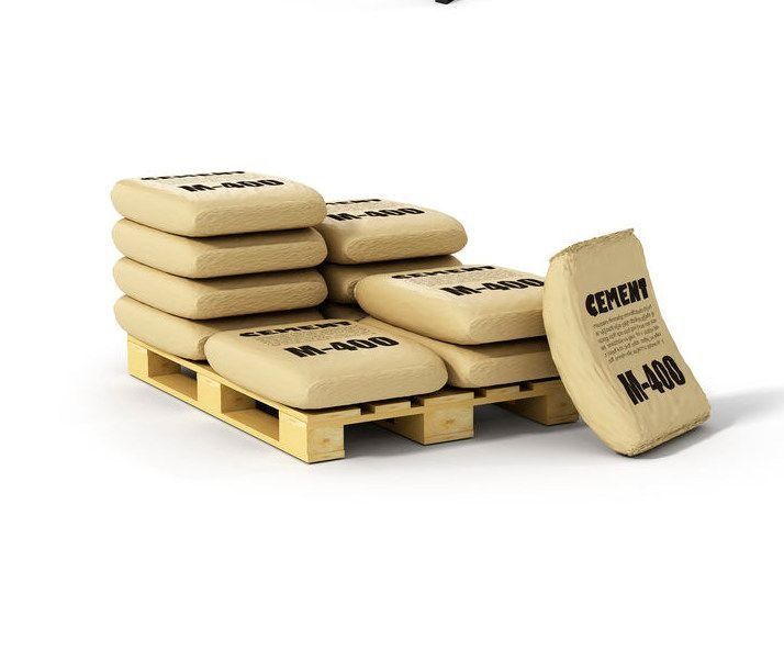 Una pila de bolsas de cemento sobre un palé de madera