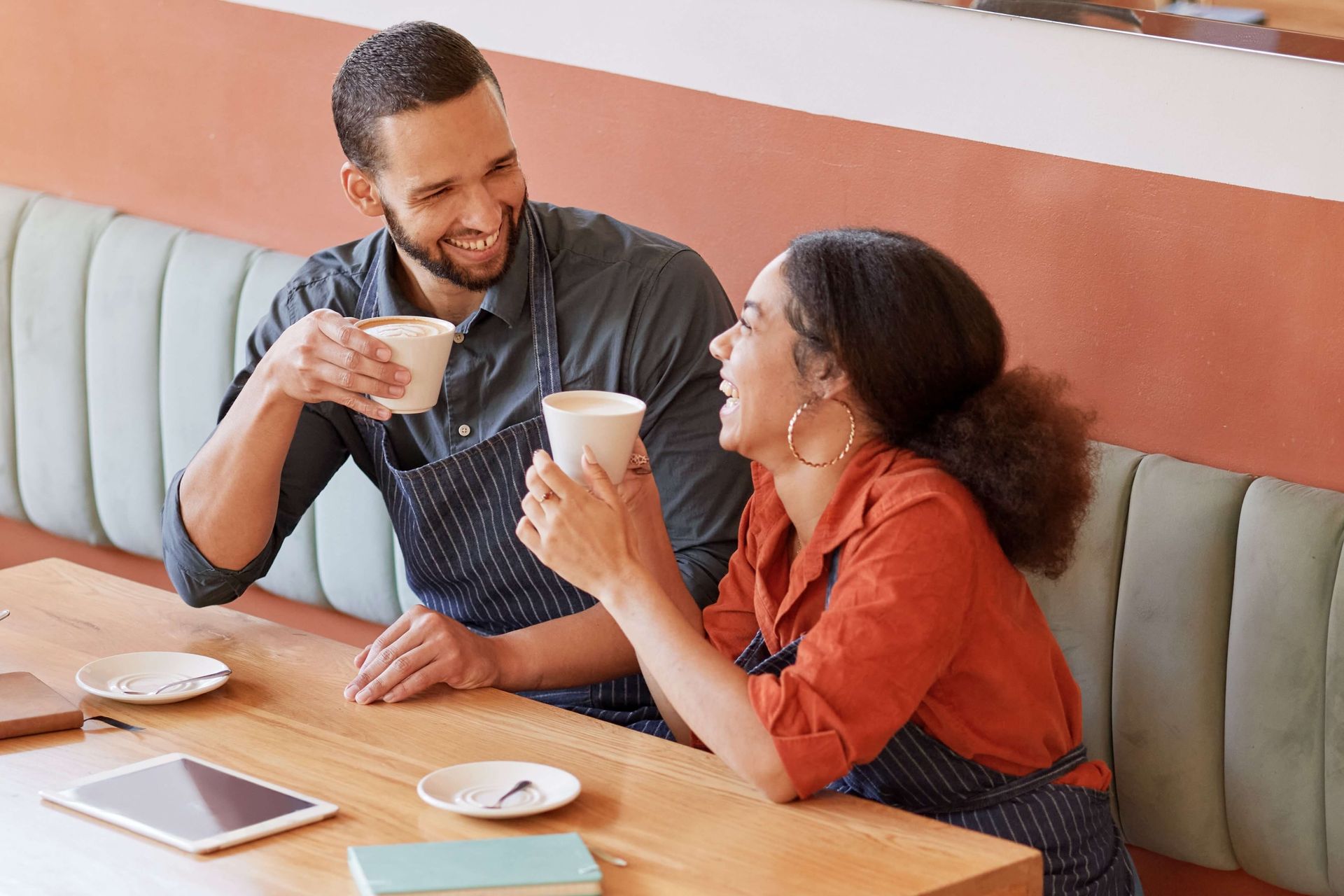 A man and a woman enjoying Big Sky Coffee.