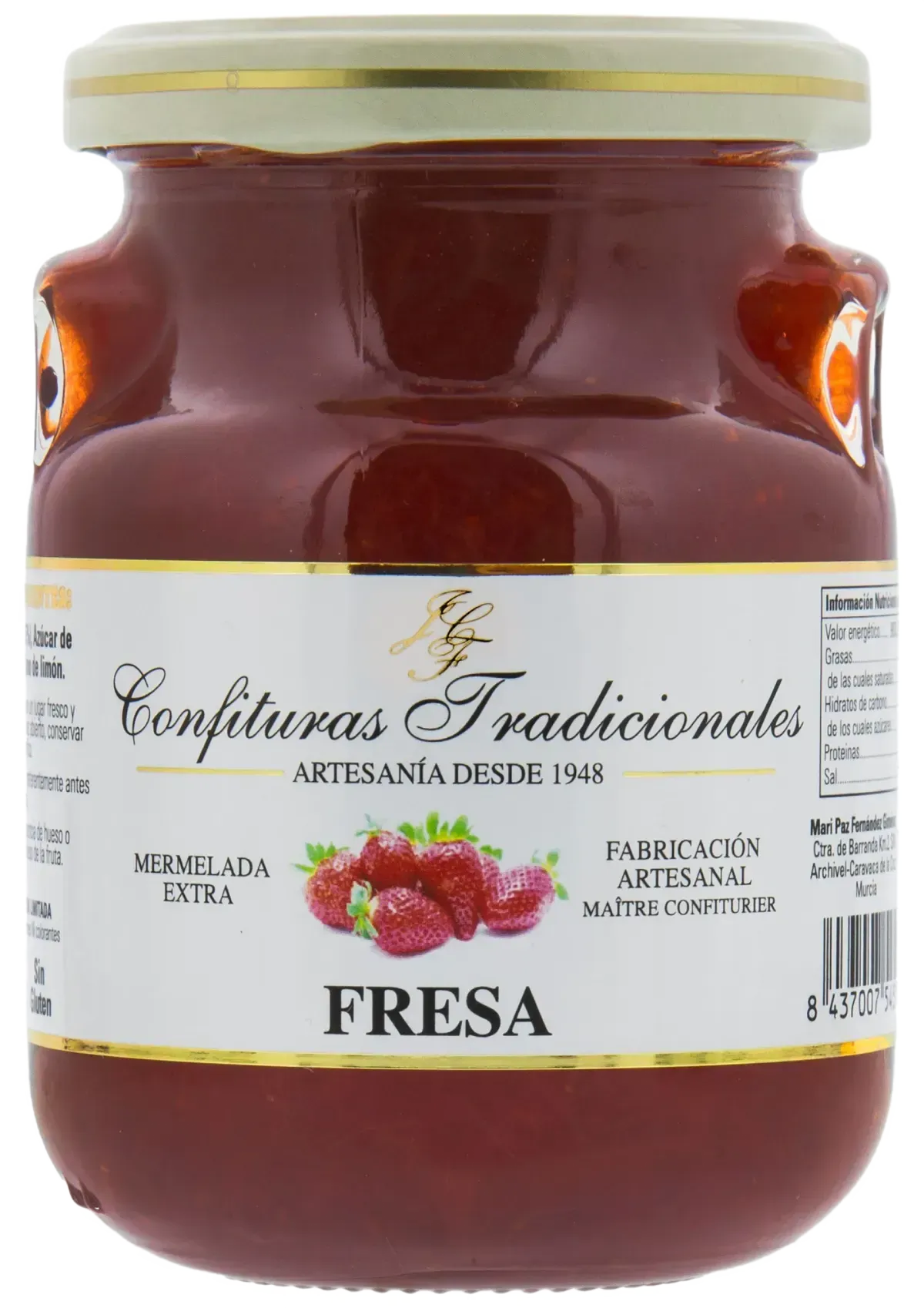 Tarro de mermelada de fresa con etiqueta color crema y tapa dorada.