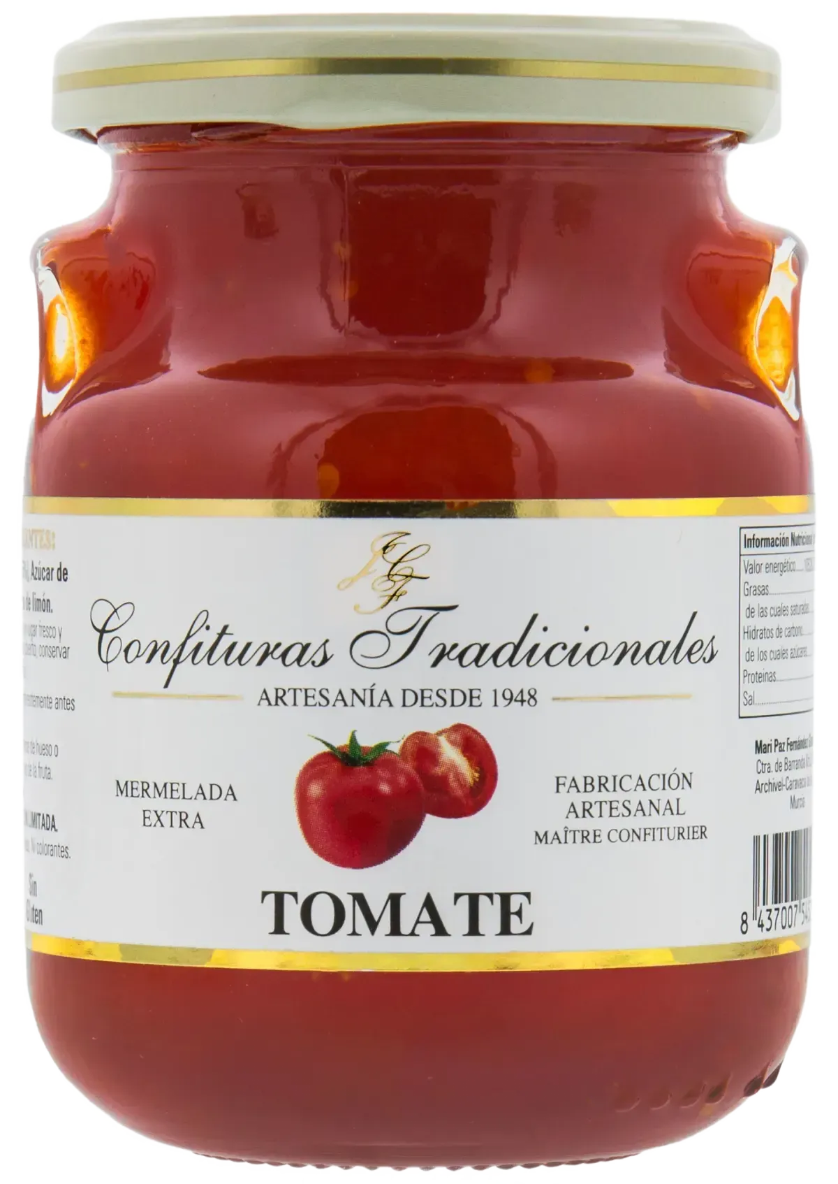 Tarro de mermelada de tomate rojo con tapa color crema y etiqueta que dice “Tomate”.