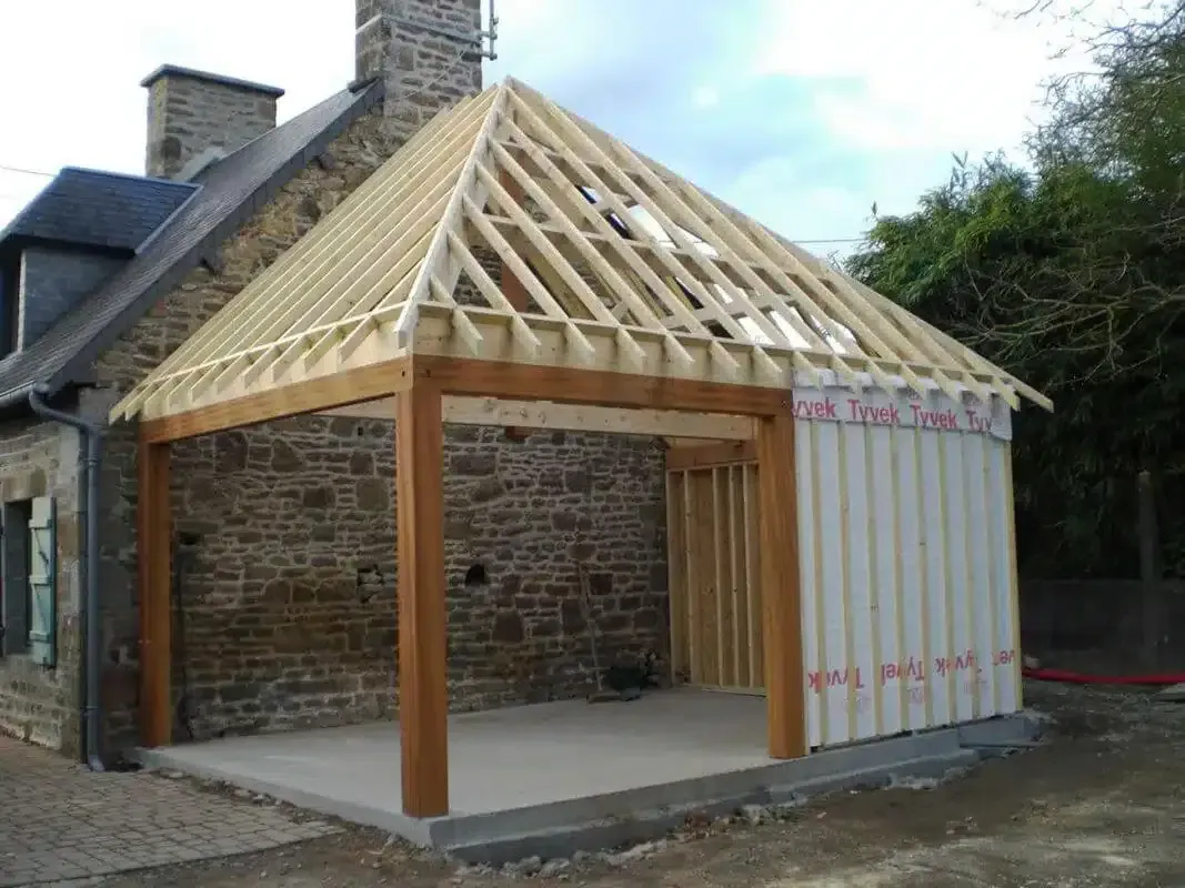 Construction d'une extension en bois sur une dalle en béton