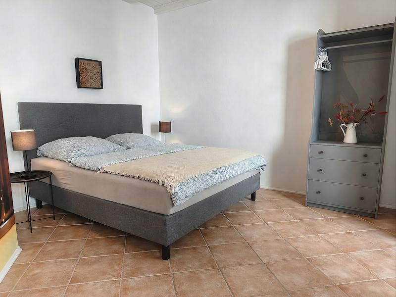 Schlafzimmer der Ferienwohnung Garten