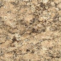 Arbeitsplatte aus hellbraunem Granit mit dunkelbraunen und schwarzen Sprenkeln.