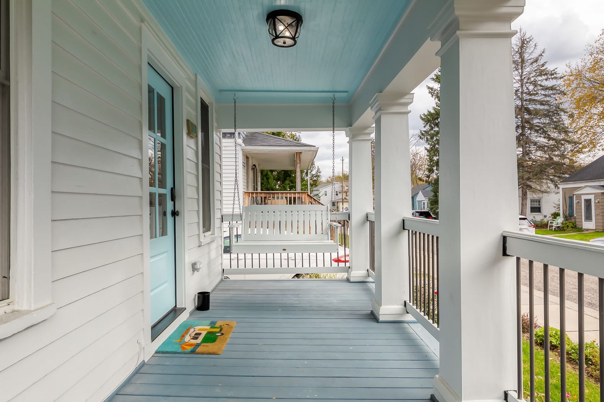 Cottage home with front porch shown