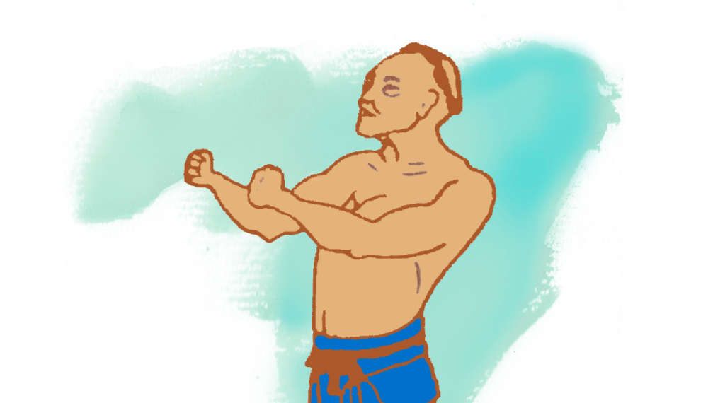 Un hombre sin camisa y con pantalones cortos azules está de pie con los brazos extendidos.