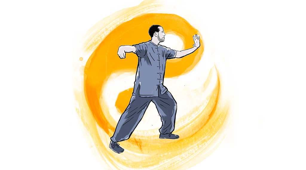 Un hombre está parado frente a un símbolo yin yang naranja.