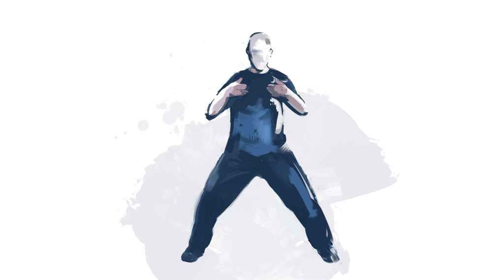 Un hombre con una camisa azul está saltando en el aire.