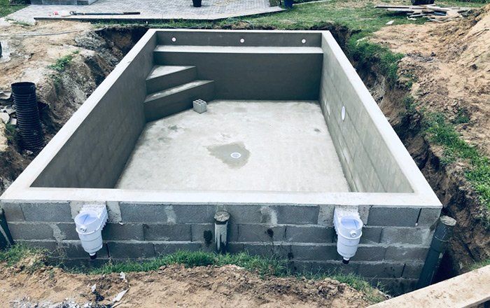 Structure en parpaings de la piscine