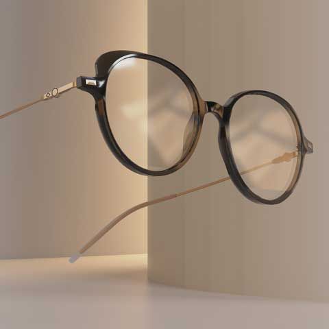 Brillengestell mit goldenen Bügeln