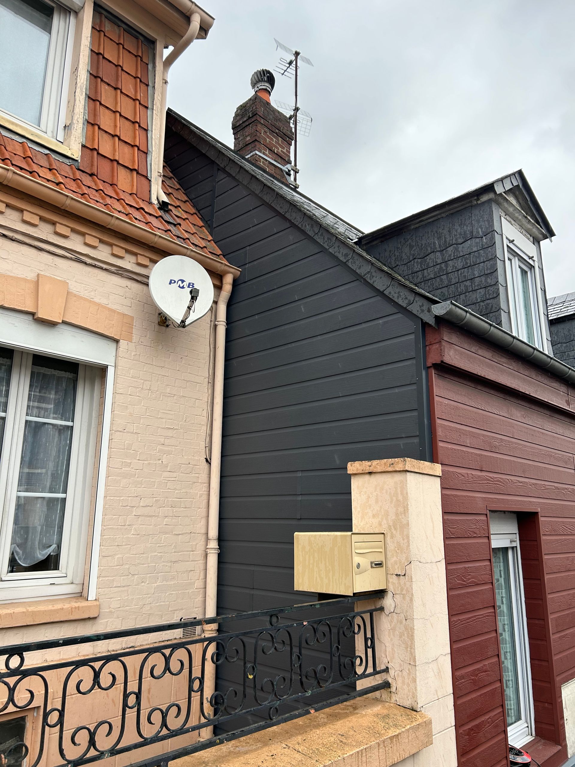 Photo de travaux de pose de bardage