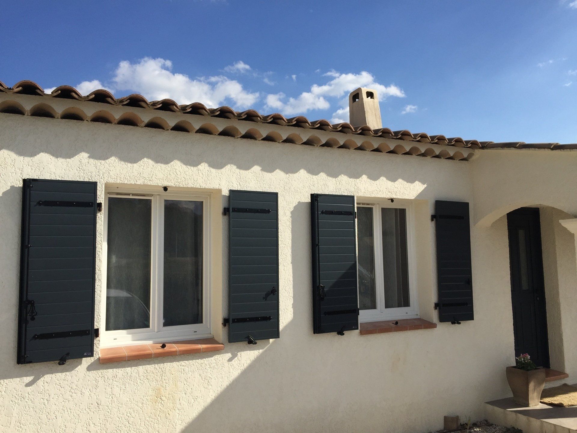 Volets aluminium et fenêtres PVC