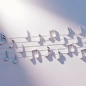 Un montón de notas musicales están colgadas en una pared.
