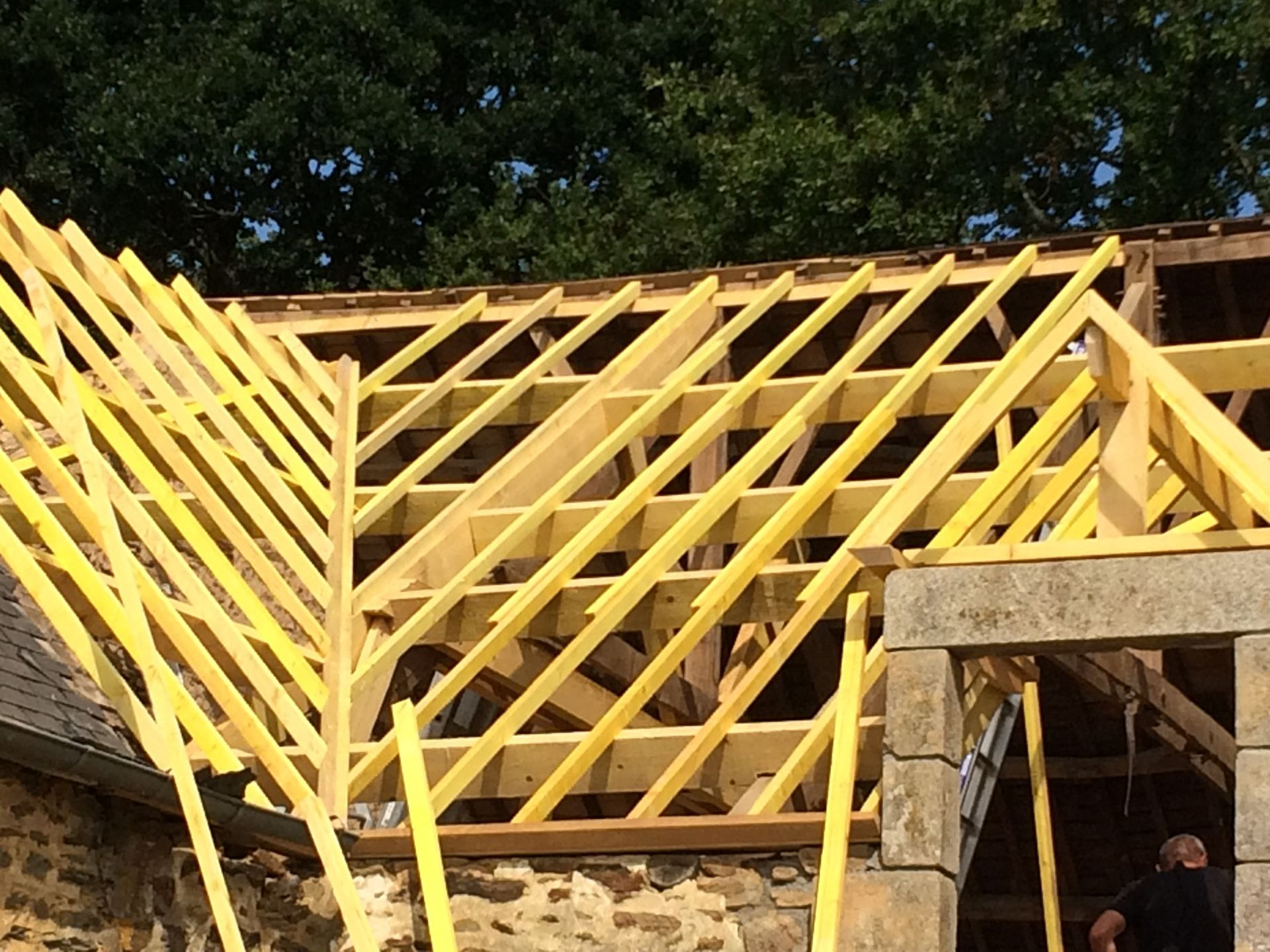 Charpente maison en L