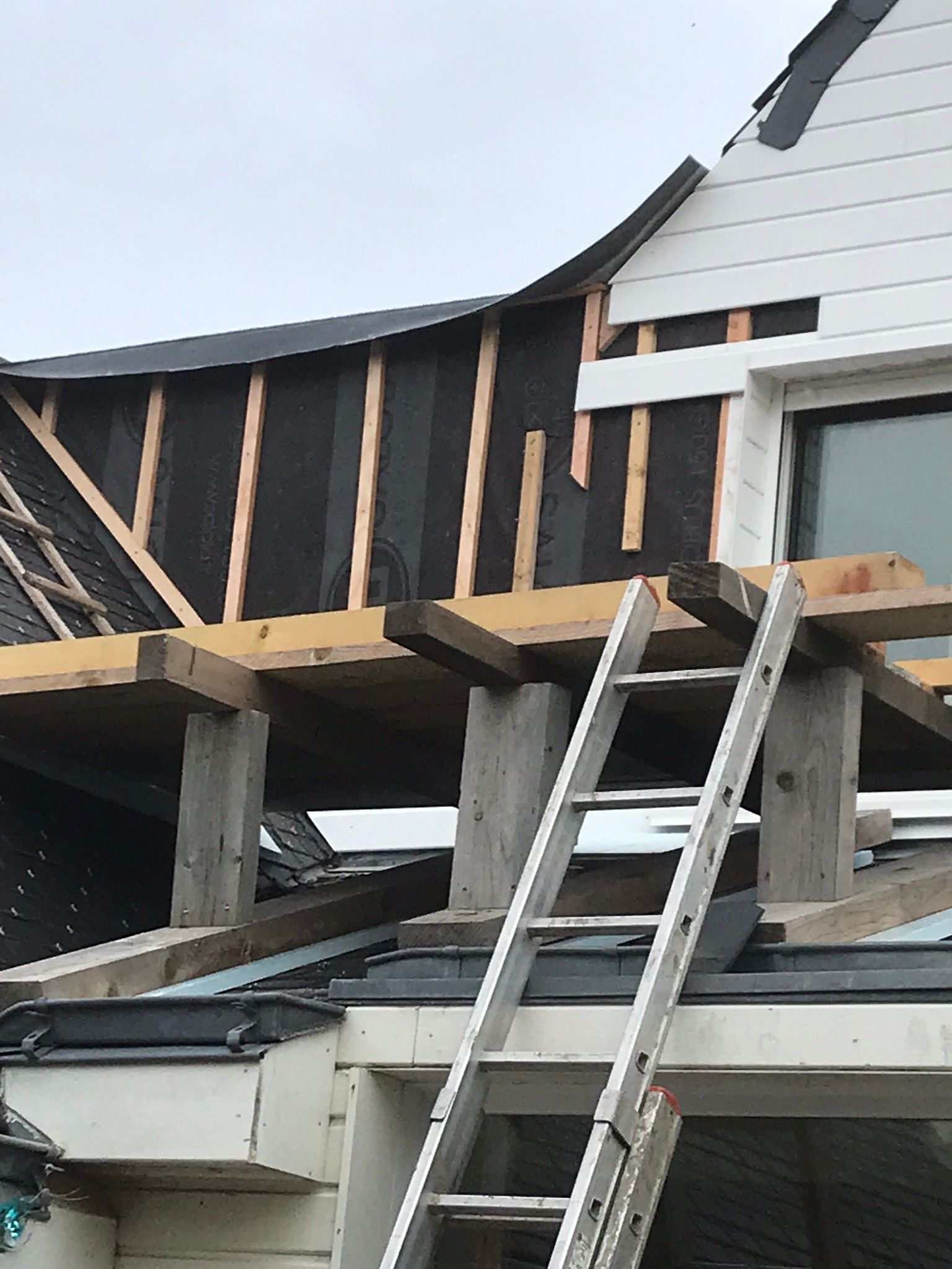 Charpente avec agrandissement