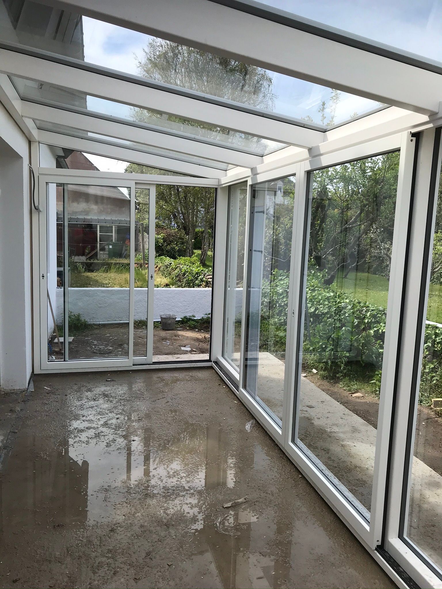 Véranda bois peint blanc intérieur et alu extérieur 