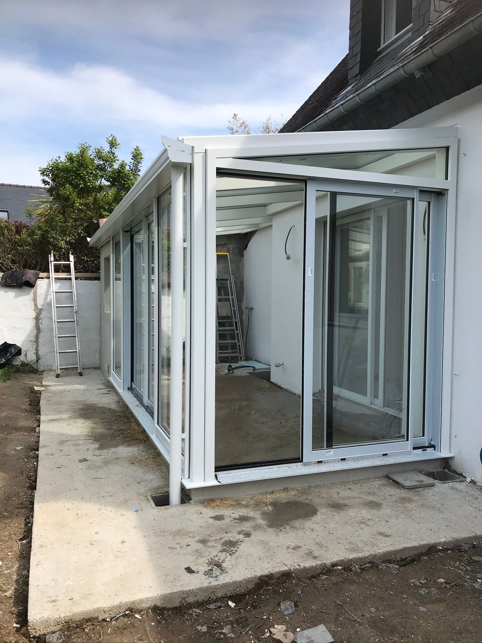 Véranda en bois intérieur et alu extérieur