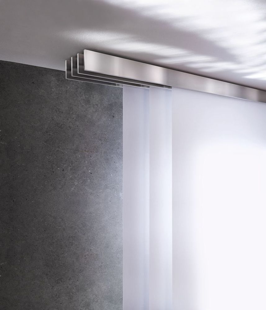 eine Schiebetür mit einem weißen Vorhang darauf - Gardinen von Koke Raumausstattung - Tobias Liebrand - vor Ort in Senden und Lüdinghausen