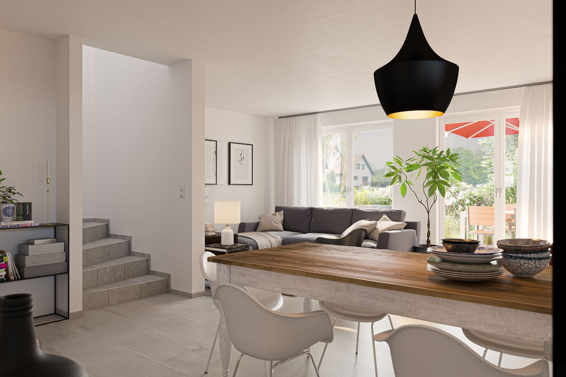 Table de salle à manger derrière la partie salon de la pièce.