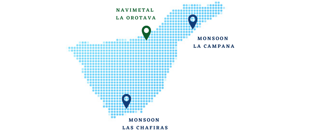 Un mapa de España con dos alfileres verdes.