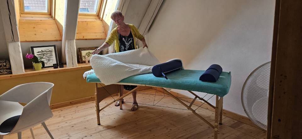 Table pour massage avec la propriétaire