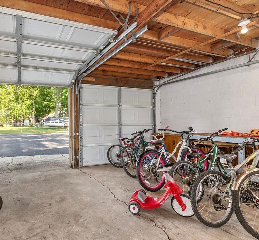 Garage interior with bikes and games.