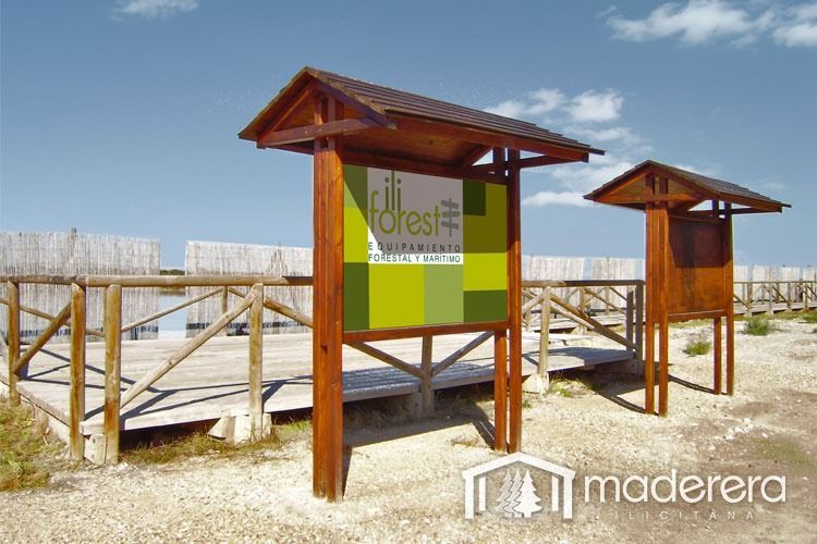 Un cartel de madera que dice flores.